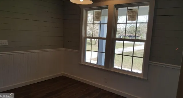 a view of a window in an empty room