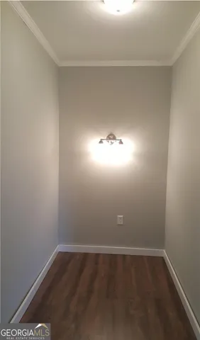 a view of a room with an empty space