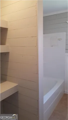 a bathroom with a bathtub