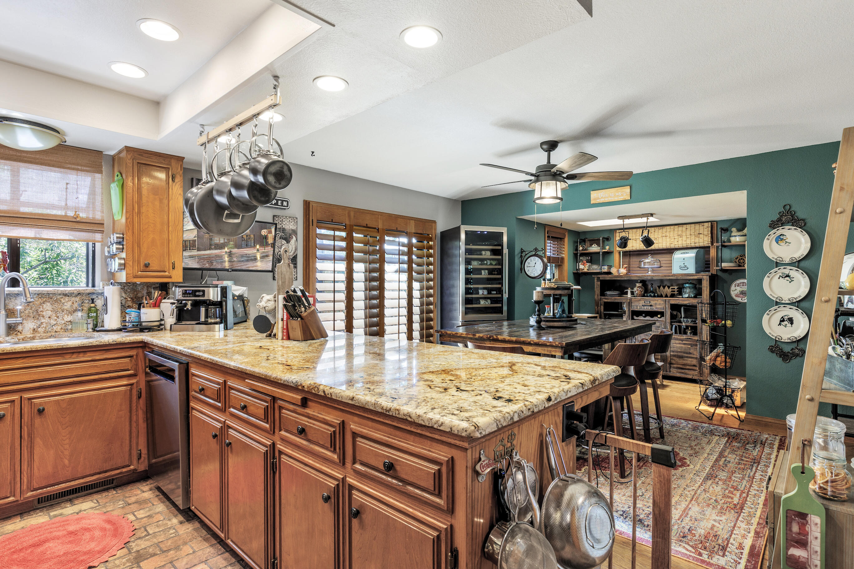 26901 Bear Valley Road Tehachapi, CA 93561 - Photo 27 of 62 a kitchen with stainless steel appliances granite countertop a sink and cabinets
