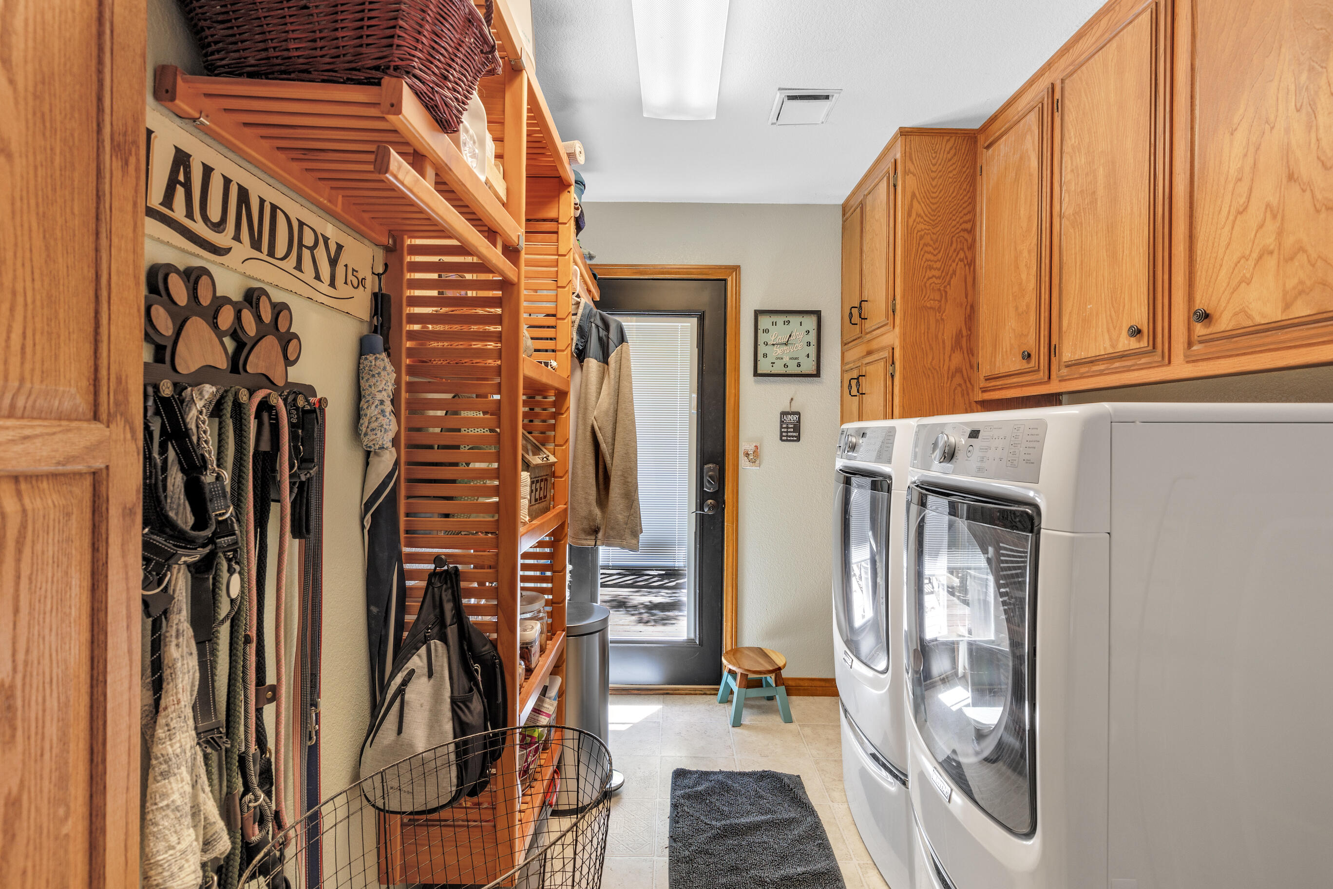 26901 Bear Valley Road Tehachapi, CA 93561 - Photo 29 of 62 a view of walk in closet with clothes and shoes