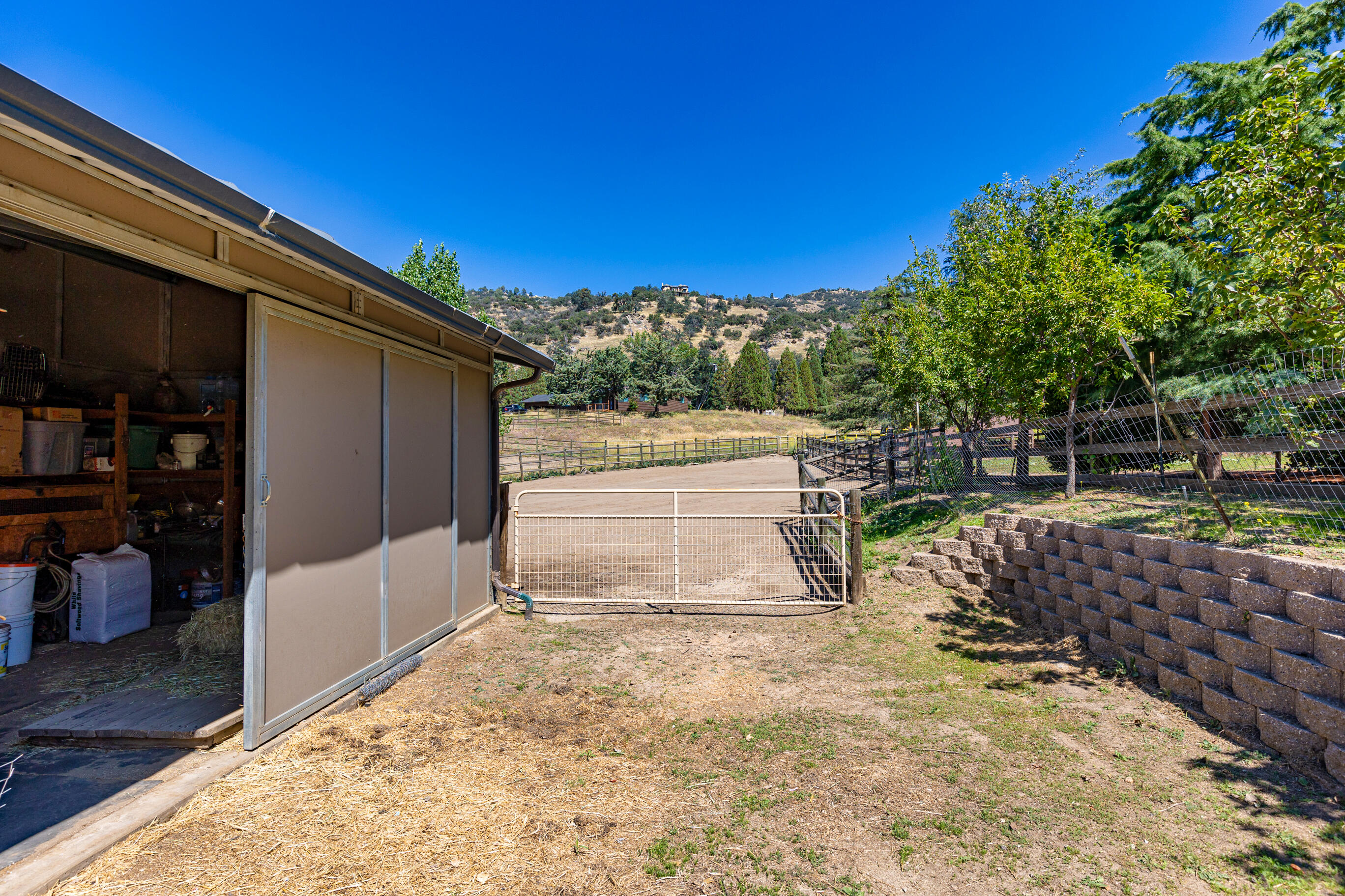 26901 Bear Valley Road Tehachapi, CA 93561 - Photo 60 of 62 a front view of a house with a yard