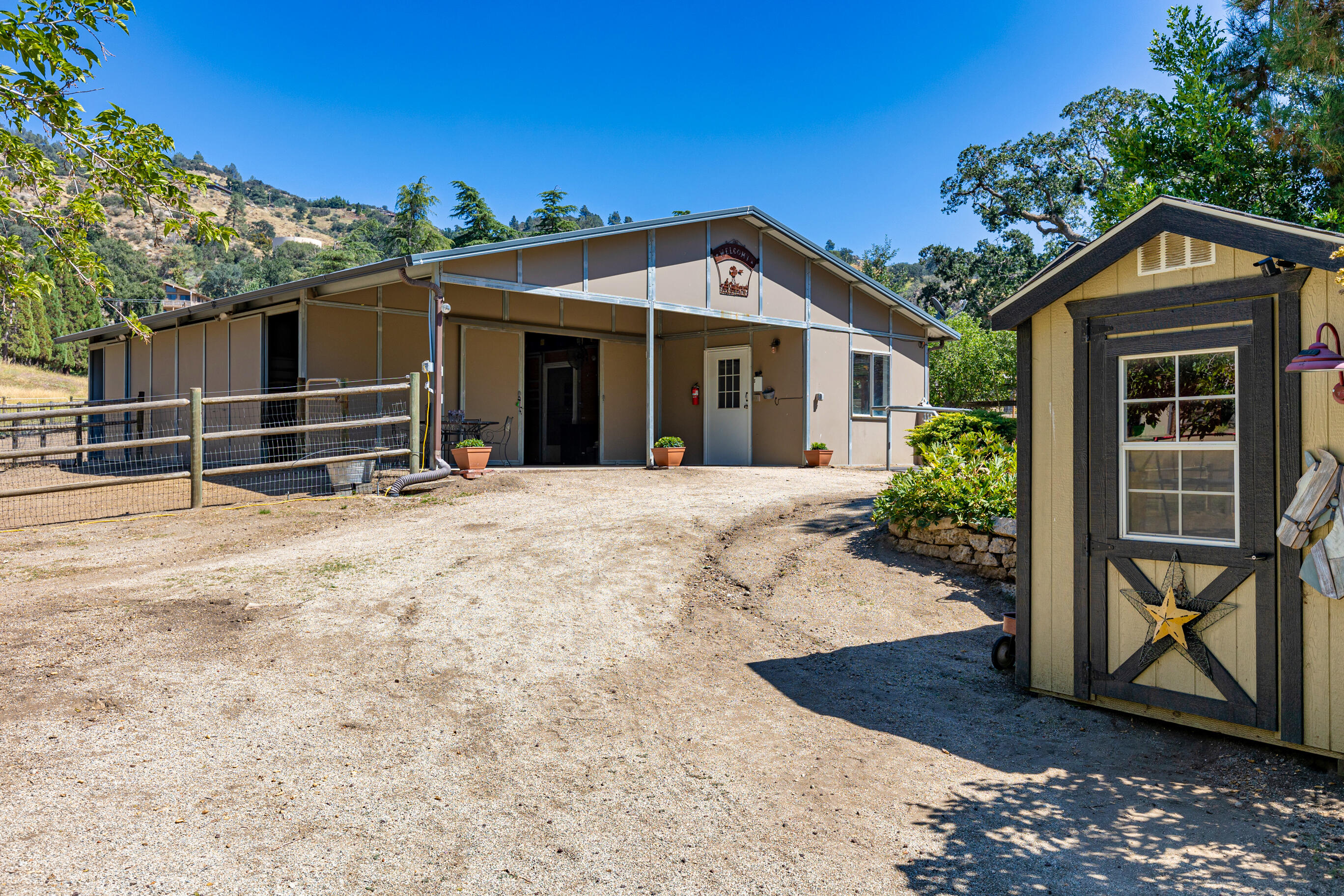 26901 Bear Valley Road Tehachapi, CA 93561 - Photo 62 of 62 front view of a house with a porch