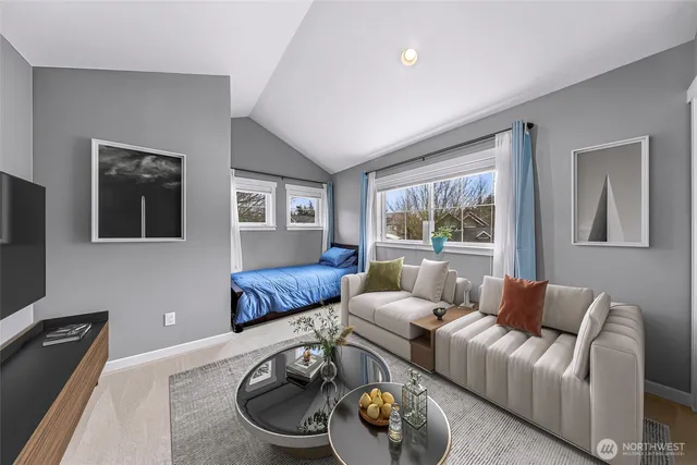 a living room with furniture and a window