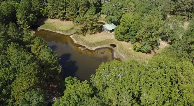 a view of a lake with a house