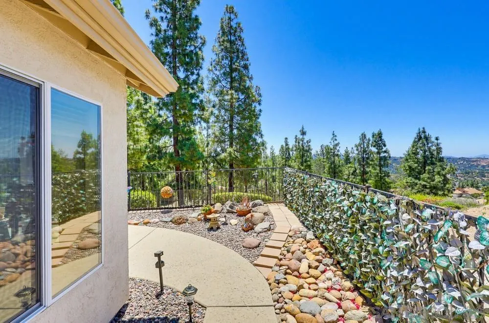 2501 Columbine Road Alpine, CA 91901 - Photo 34 of 44 a view of a patio with chair and tables