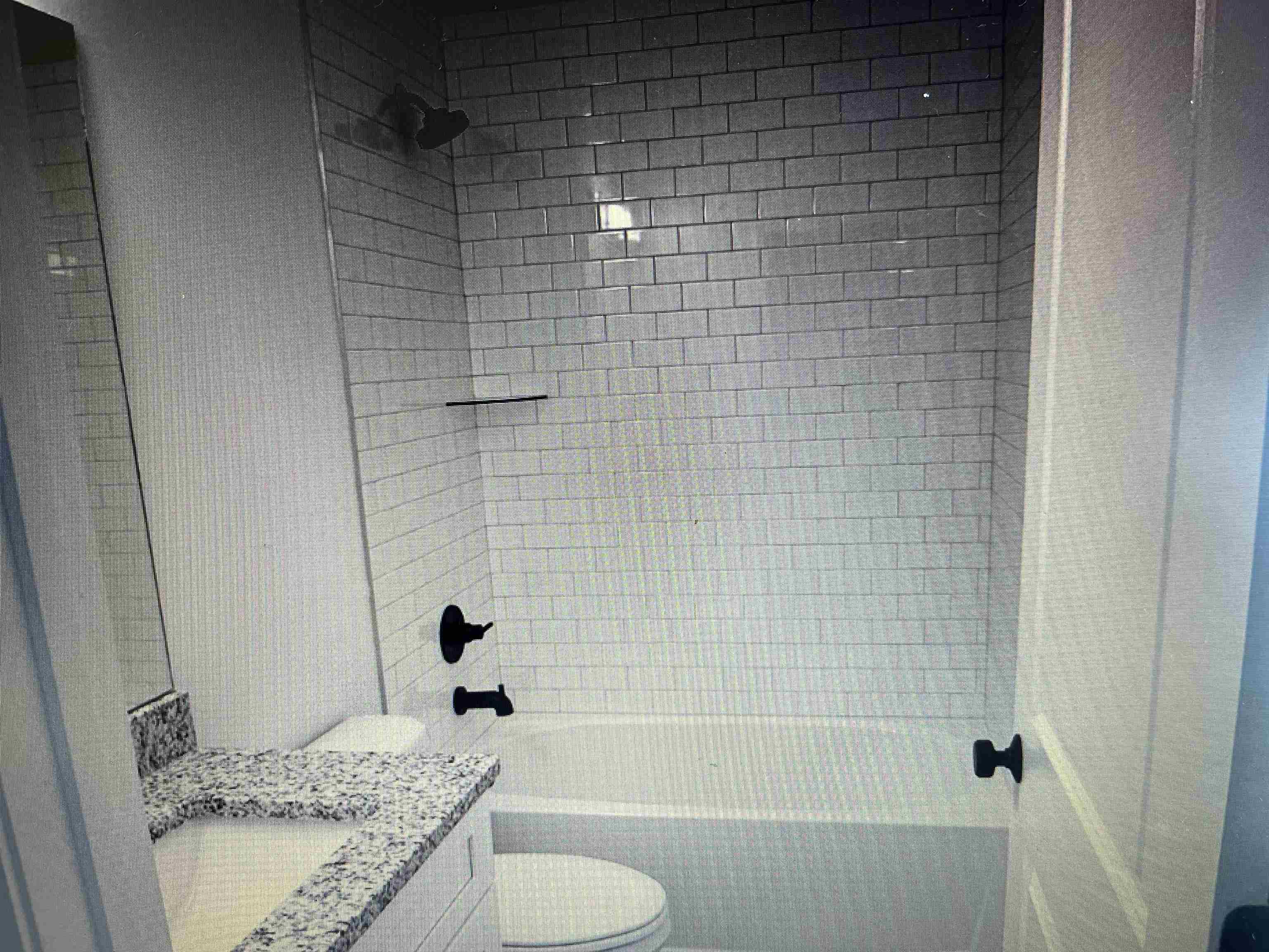 231 Monterey Avenue St. Augustine, FL 32084 - Photo 11 of 15 a bathroom with a granite countertop bathtub shower and toilet