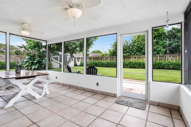 a view of an empty room with a large window