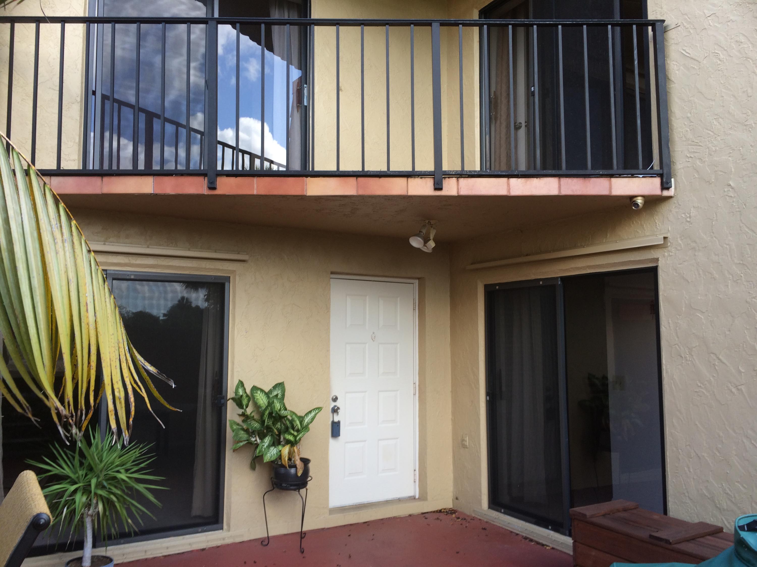 8384 Trent Court, Unit D Boca Raton, FL 33433 - Photo 24 of 24 FRONT ENTRY AND BALCONY