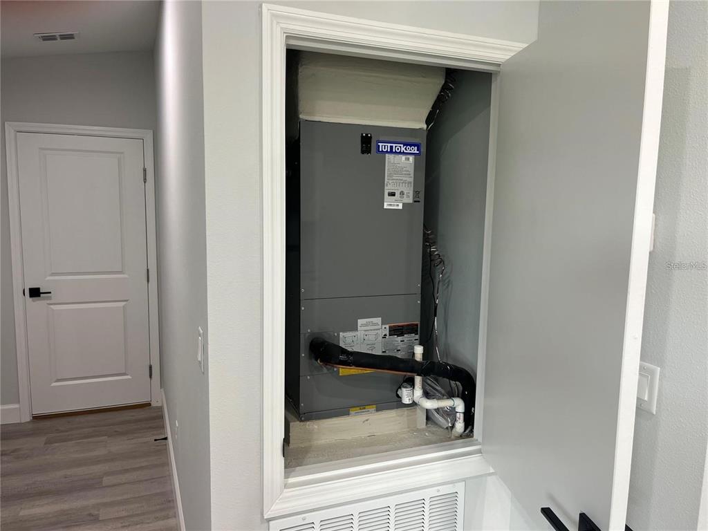 7213 Ancha Street Sebring, FL 33872 - Photo 13 of 18 a bathroom with a sink and a mirror