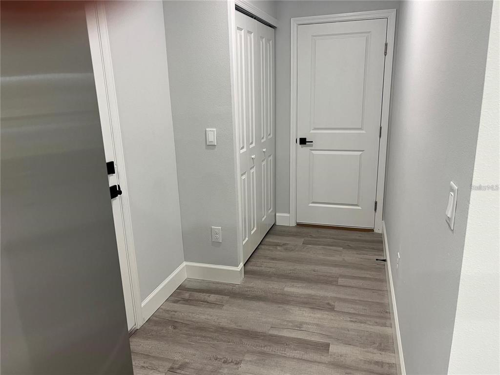 7213 Ancha Street Sebring, FL 33872 - Photo 7 of 18 a view of a hallway