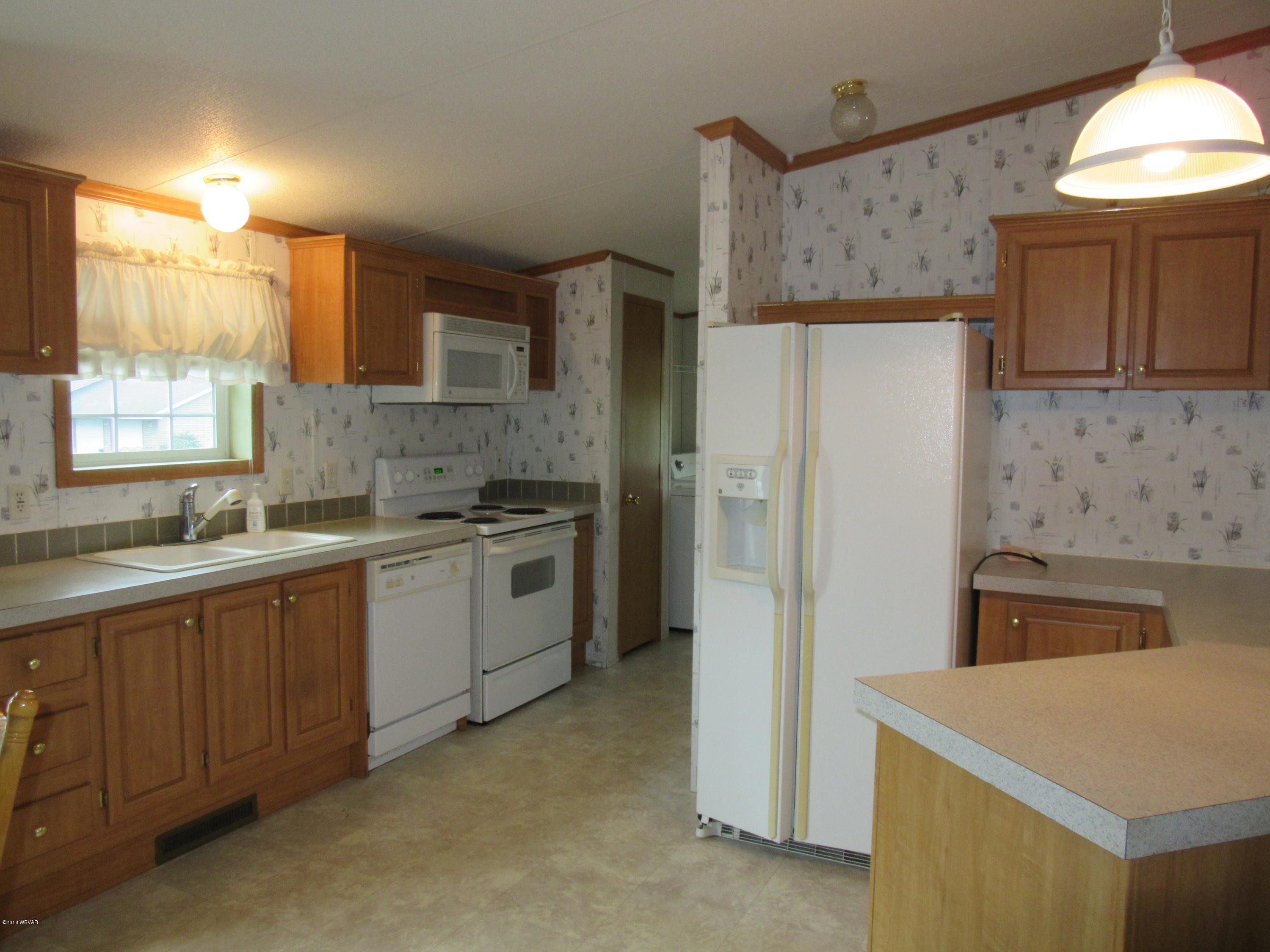 1050 Long Run Road Mill Hall, PA 17751 - Photo 9 of 23 Appliances included Microwave, DW, Range, Ref, Washer & Dryer