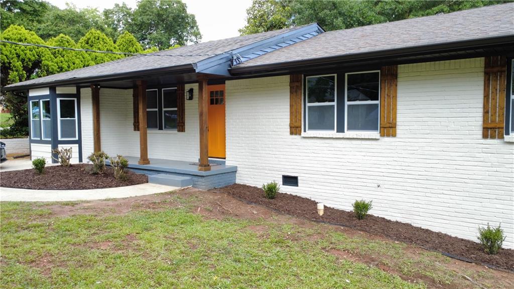 2786 Knollview Drive Decatur, GA 30034 - Photo 1 of 1 a front view of a house with garden
