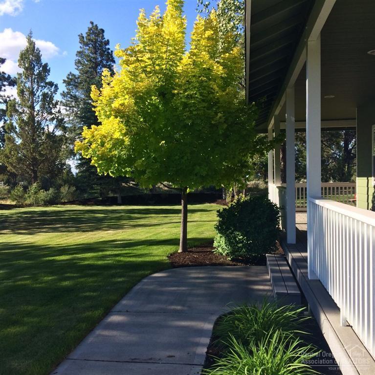 60670 Billadeau Road Bend, OR 97702 - Photo 4 of 25 a view of a house with a yard