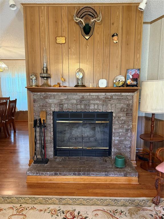 9300 Ottawa Street New Port Richey, FL 34654 - Photo 23 of 37 a fireplace with a sink and a mirror