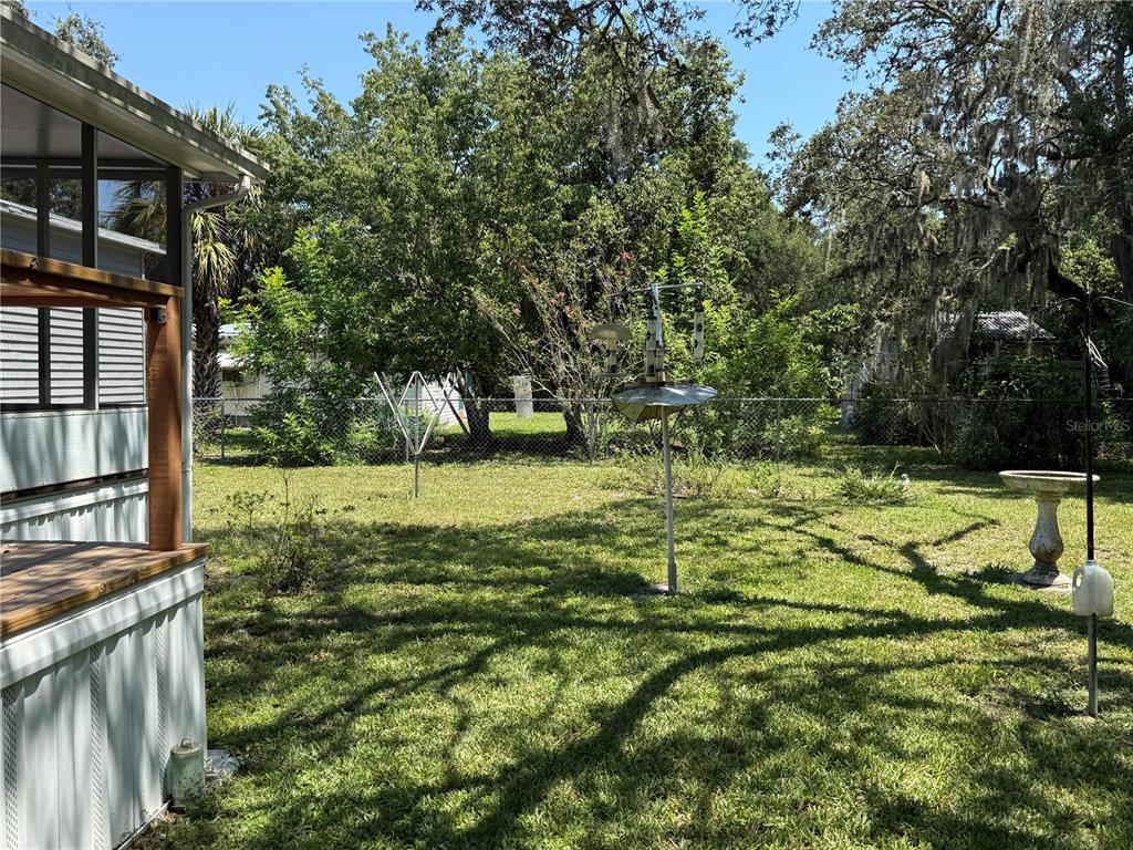 9300 Ottawa Street New Port Richey, FL 34654 - Photo 9 of 37 a view of a yard