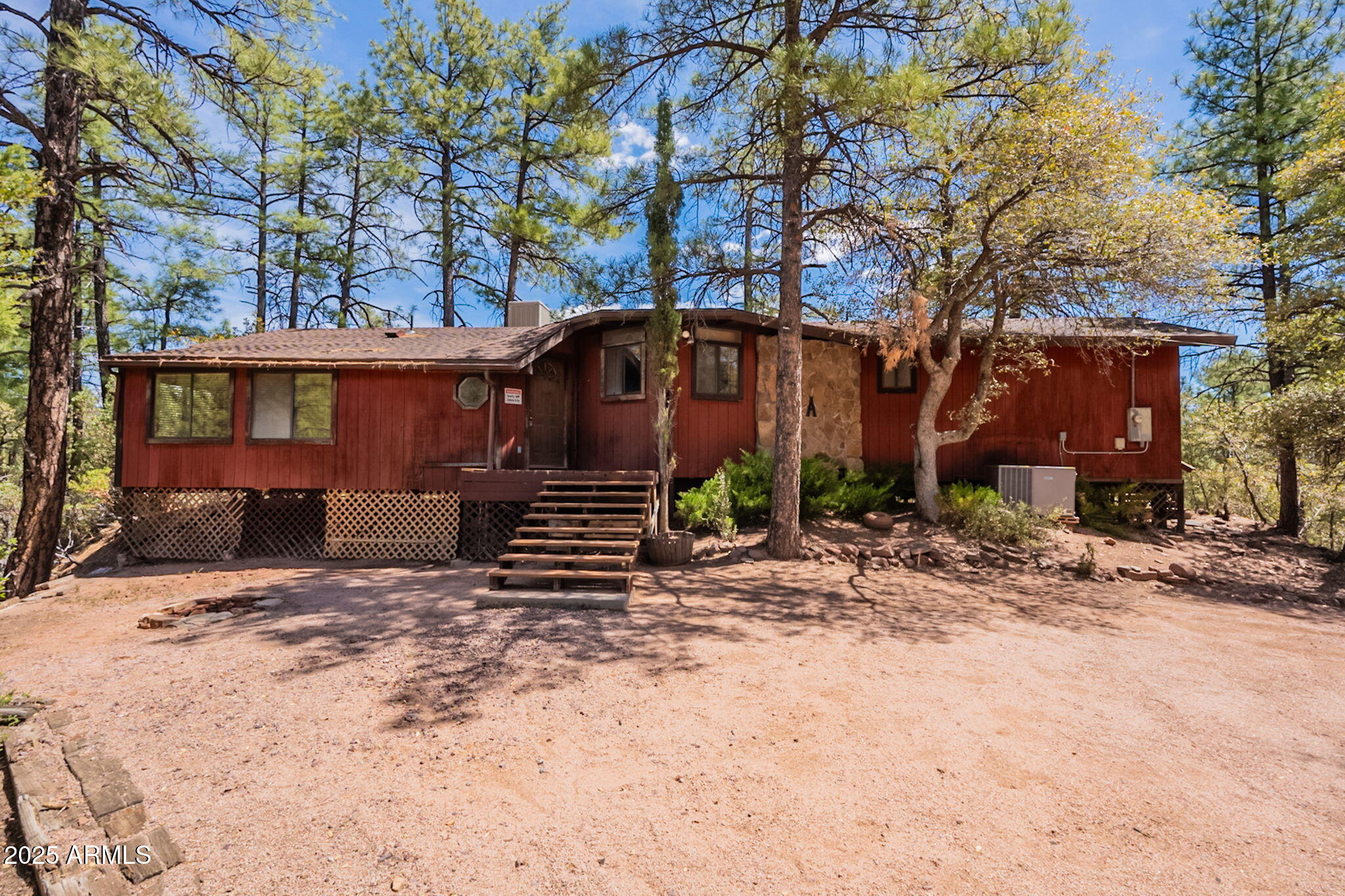 3524 Kelly Circle Pine, AZ 85544 - Photo 1 of 69 a view of a house with a yard covered in snow
