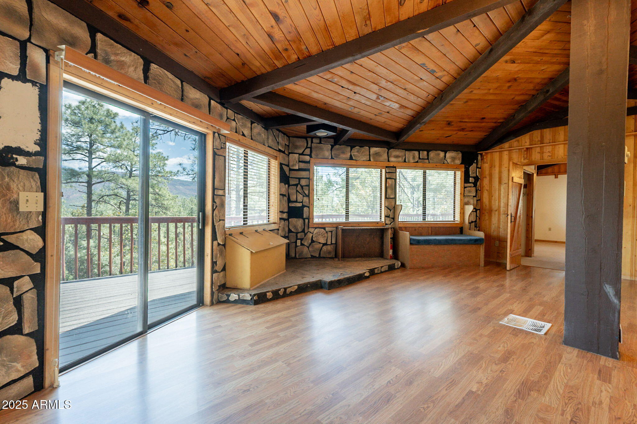 3524 Kelly Circle Pine, AZ 85544 - Photo 13 of 69 a living room with furniture floor to ceiling window and wooden floor