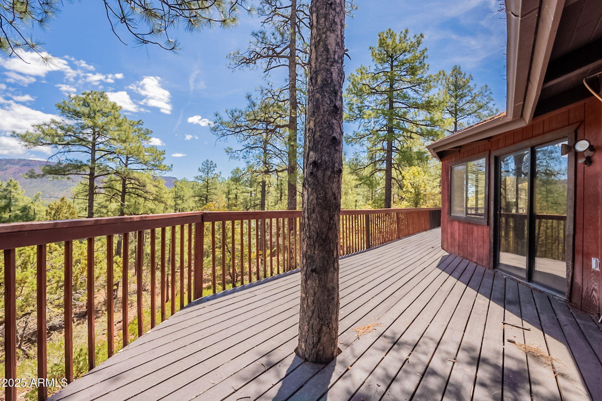3524 Kelly Circle Pine, AZ 85544 - Photo 2 of 69 a view of balcony with wooden floor