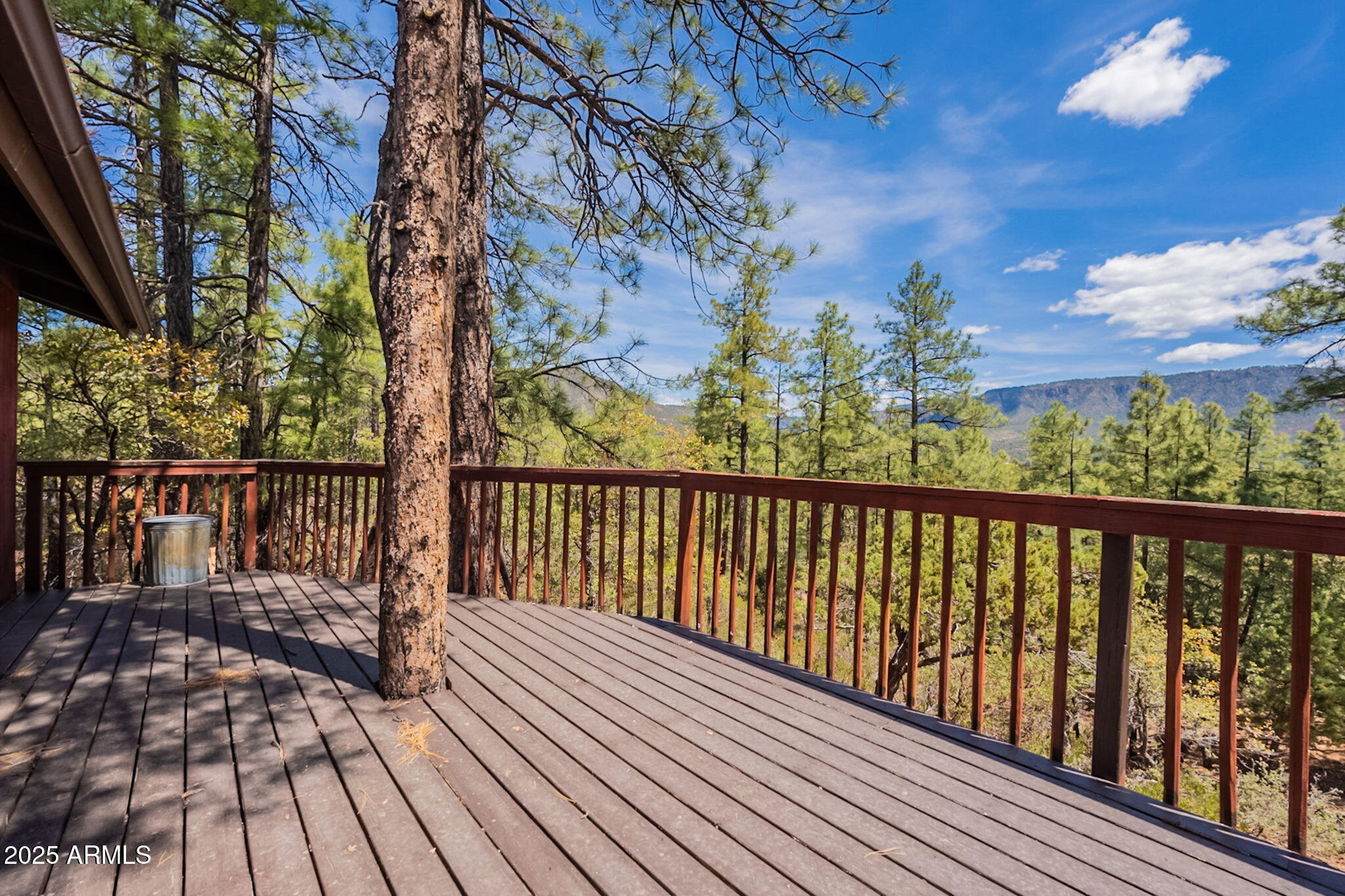 3524 Kelly Circle Pine, AZ 85544 - Photo 34 of 69 a view of a balcony with wooden floor