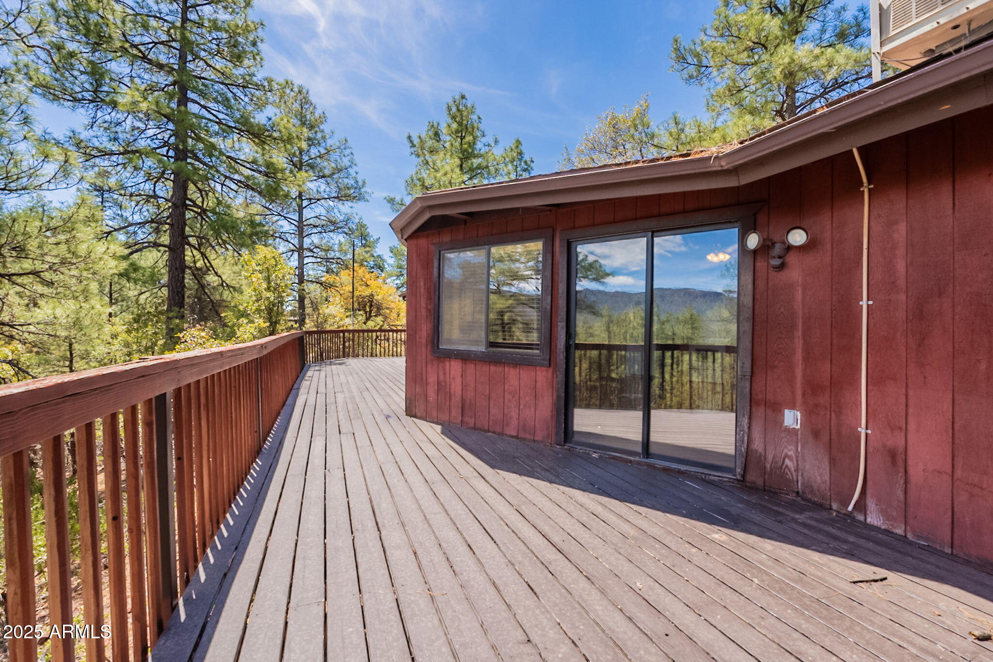3524 Kelly Circle Pine, AZ 85544 - Photo 35 of 69 a view of a balcony with wooden floor