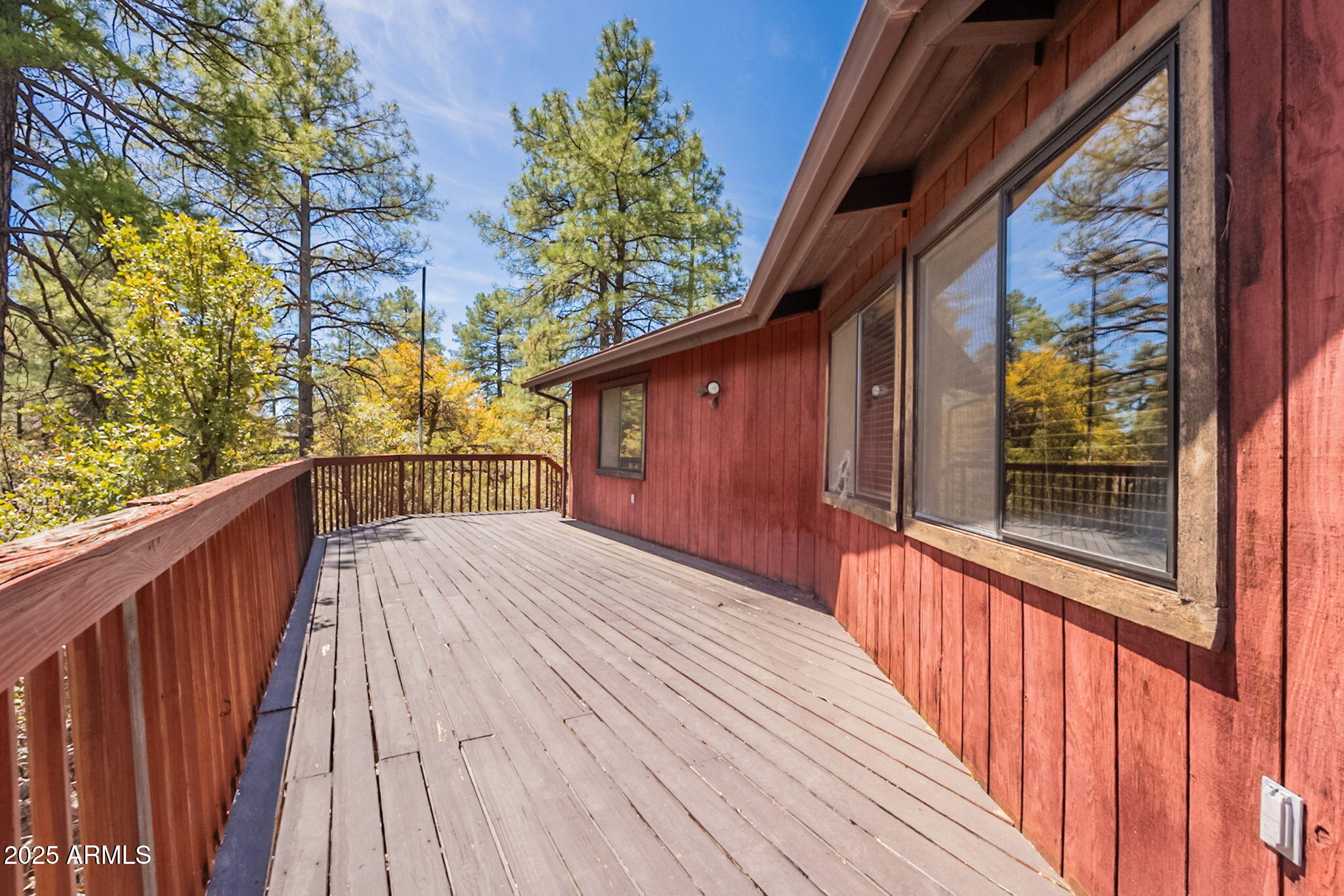 3524 Kelly Circle Pine, AZ 85544 - Photo 37 of 69 a view of backyard with a deck and wooden floor