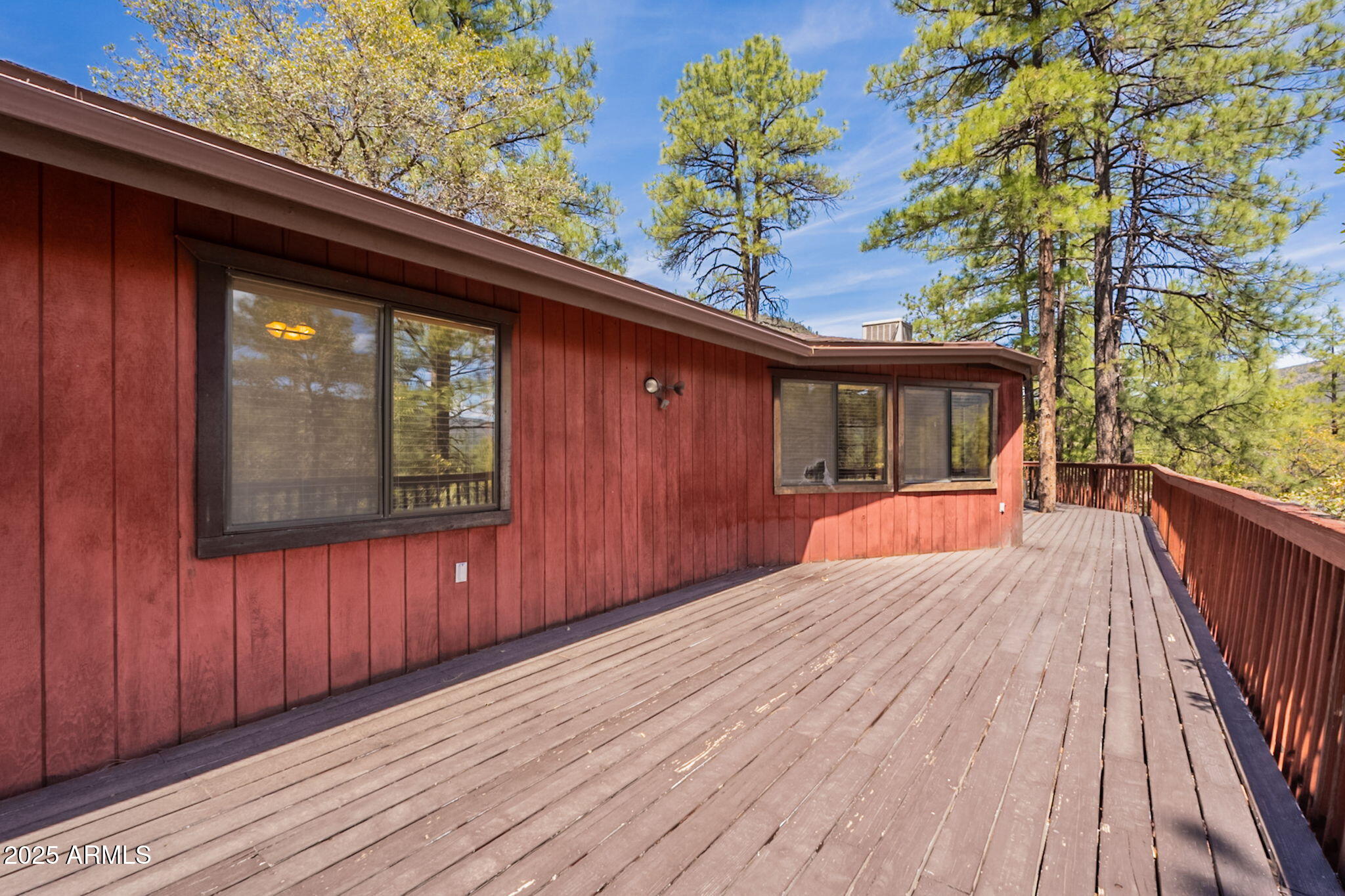 3524 Kelly Circle Pine, AZ 85544 - Photo 38 of 69 a view of backyard with a deck and wooden floor