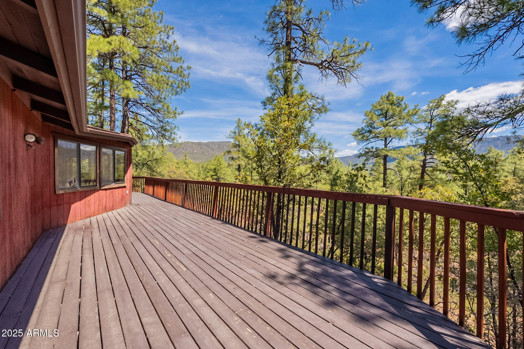 3524 Kelly Circle Pine, AZ 85544 - Photo 3 of 69 a view of balcony with wooden floor