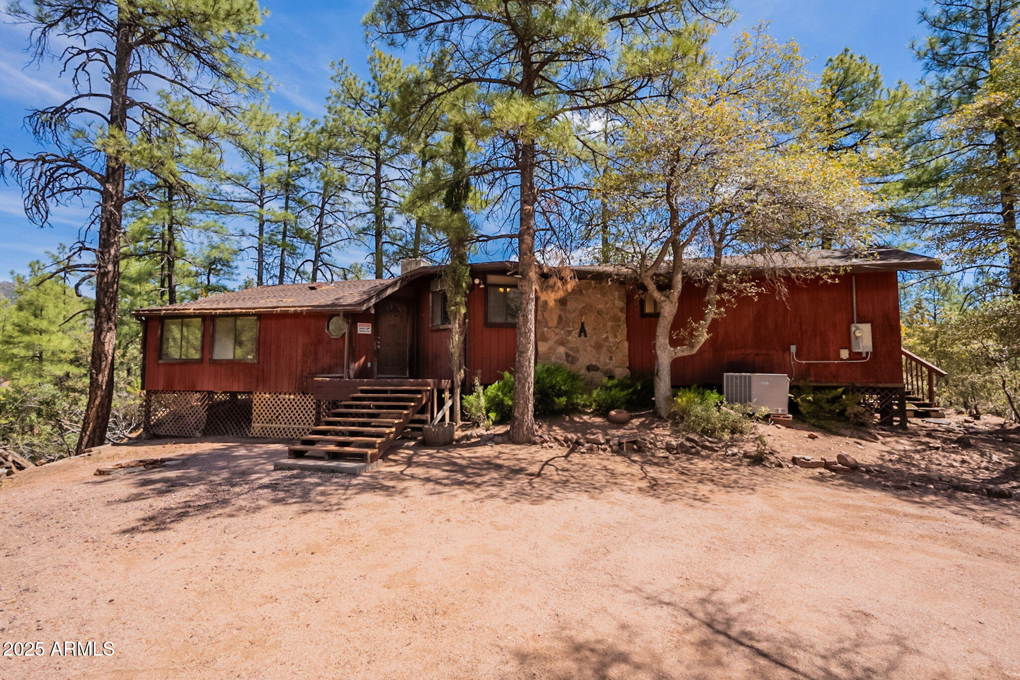 3524 Kelly Circle Pine, AZ 85544 - Photo 41 of 69 a view of a house with a yard covered in snow