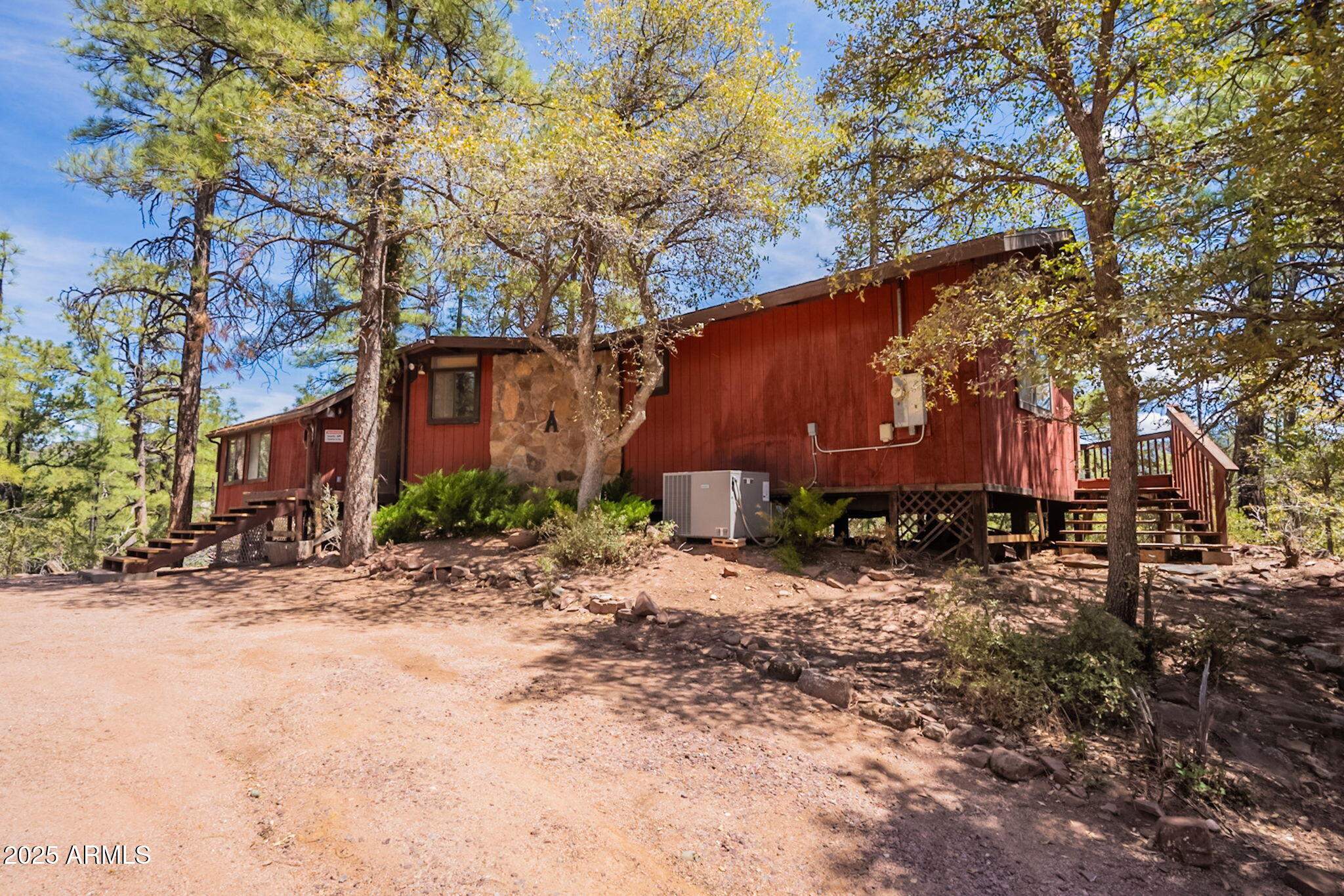 3524 Kelly Circle Pine, AZ 85544 - Photo 44 of 69 a front view of a house with a yard