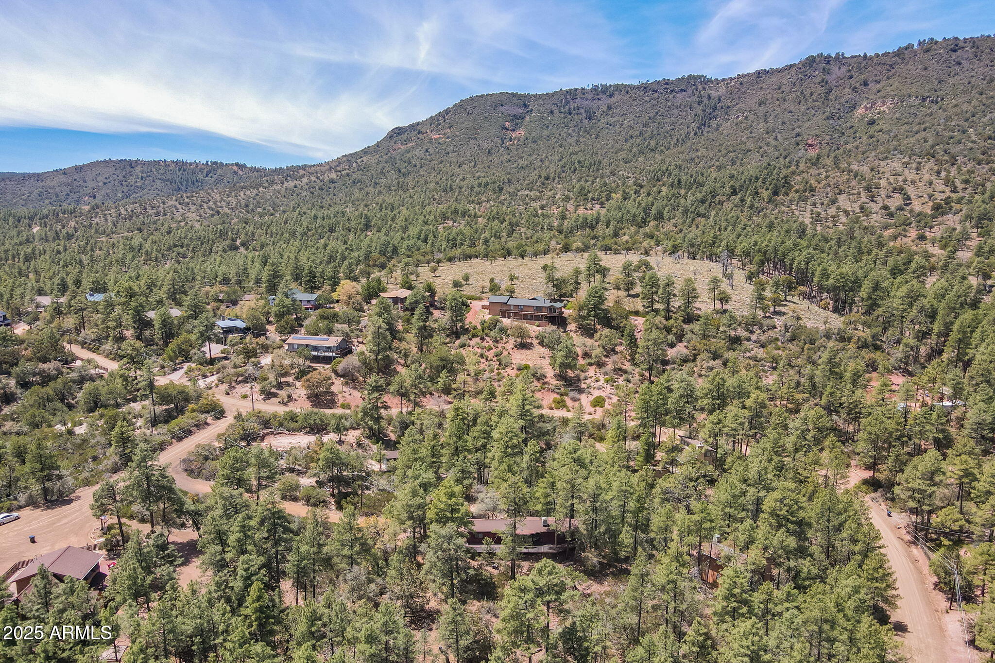 3524 Kelly Circle Pine, AZ 85544 - Photo 64 of 69 a view of a mountain range in a cloudy sky