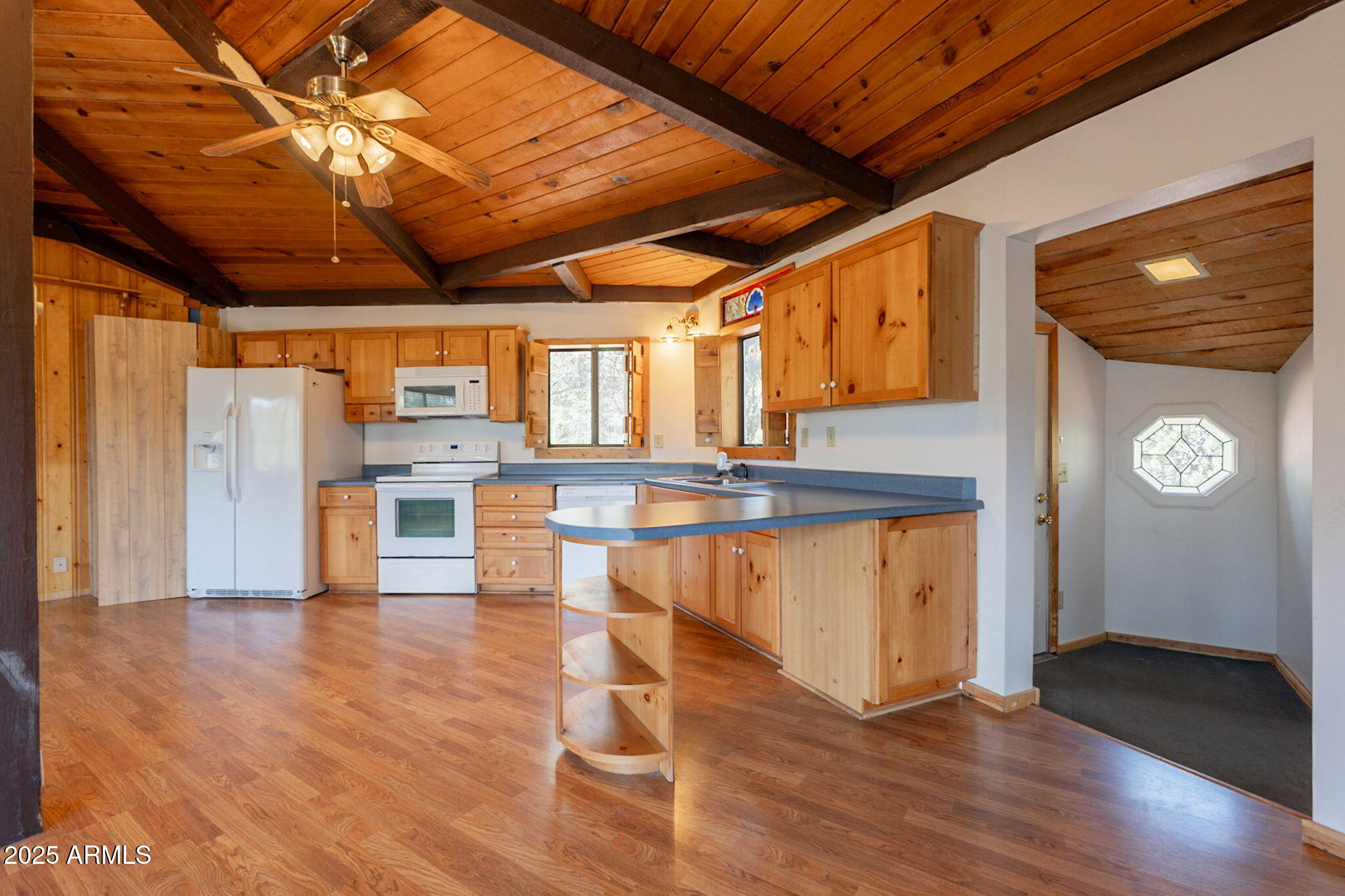 3524 Kelly Circle Pine, AZ 85544 - Photo 7 of 69 a view of a hallway with wooden floor
