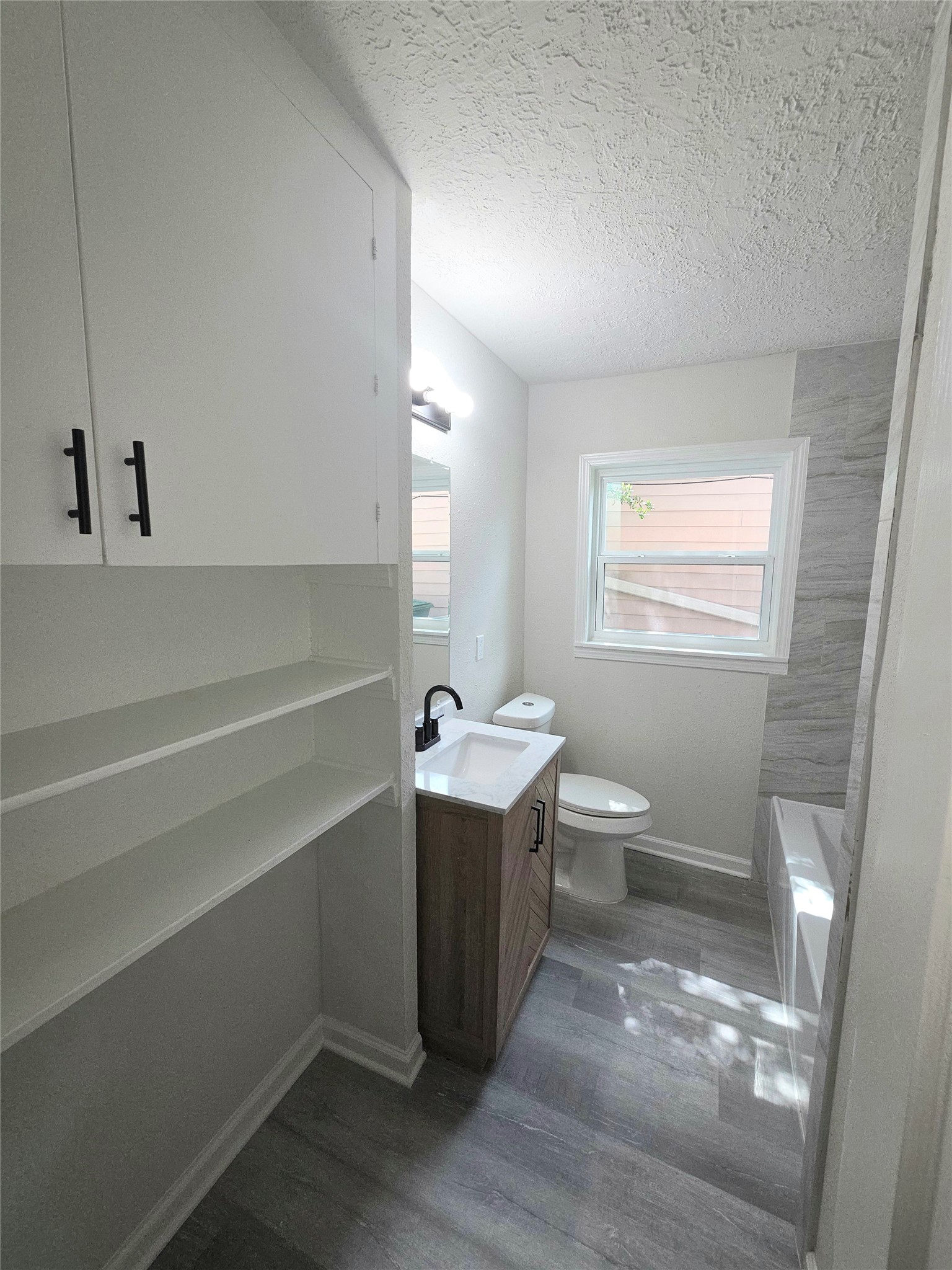 4931 Cosby Street Houston, TX 77021 - Photo 10 of 14 guest bathroom with lots of storage