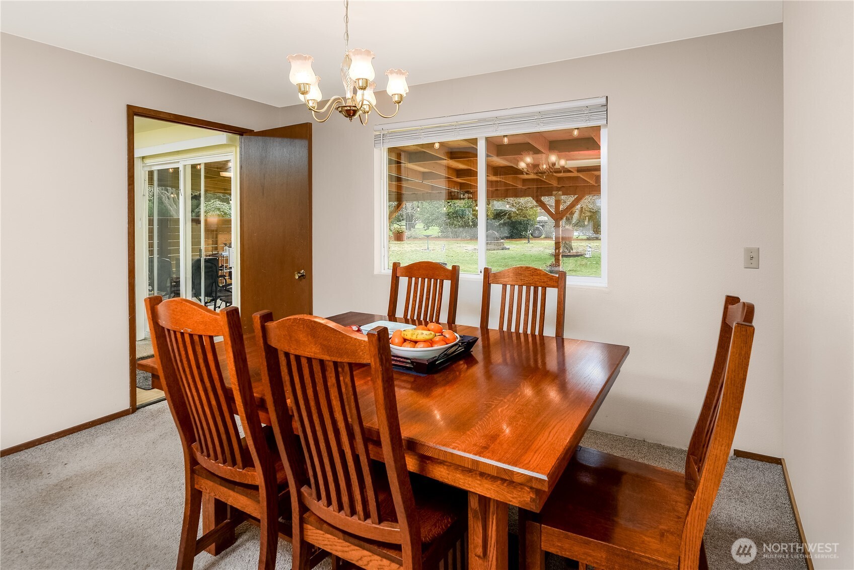 1111 West Alder Court Sequim, WA 98382 - Photo 11 of 37 a view of a dining room with furniture window and outside view