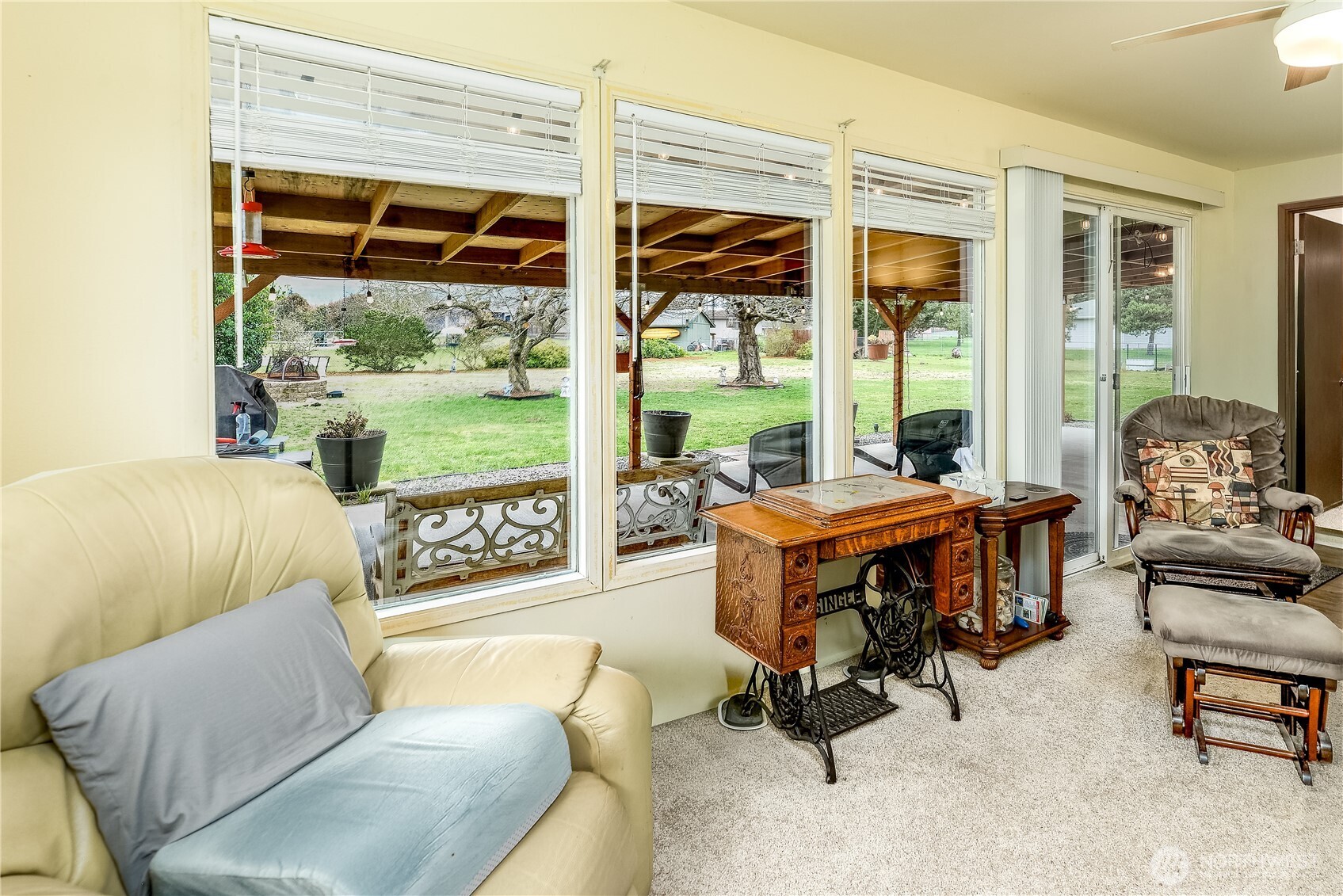 1111 West Alder Court Sequim, WA 98382 - Photo 17 of 37 a living room with patio area and balcony view