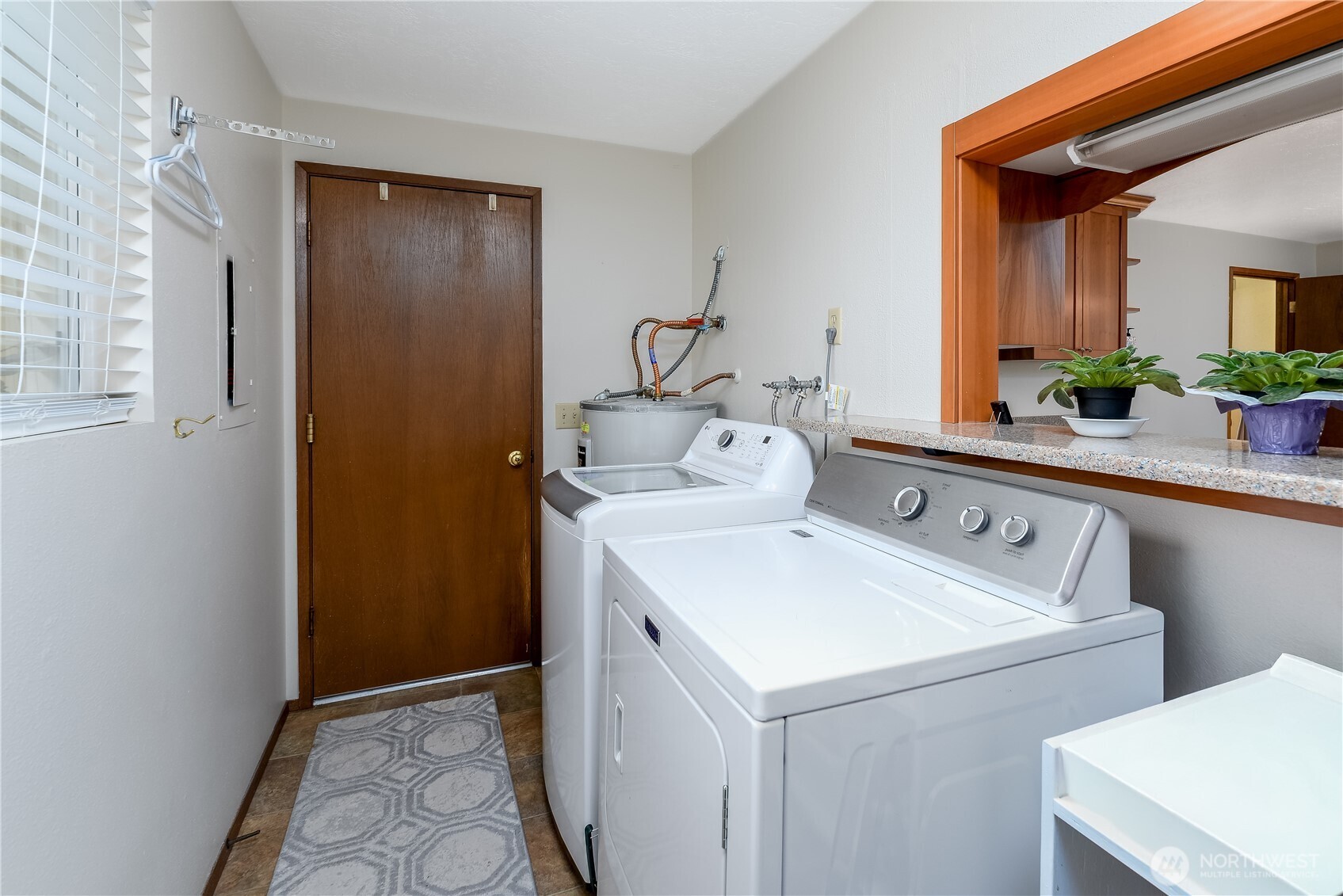 1111 West Alder Court Sequim, WA 98382 - Photo 27 of 37 a utility room with dryer and washer
