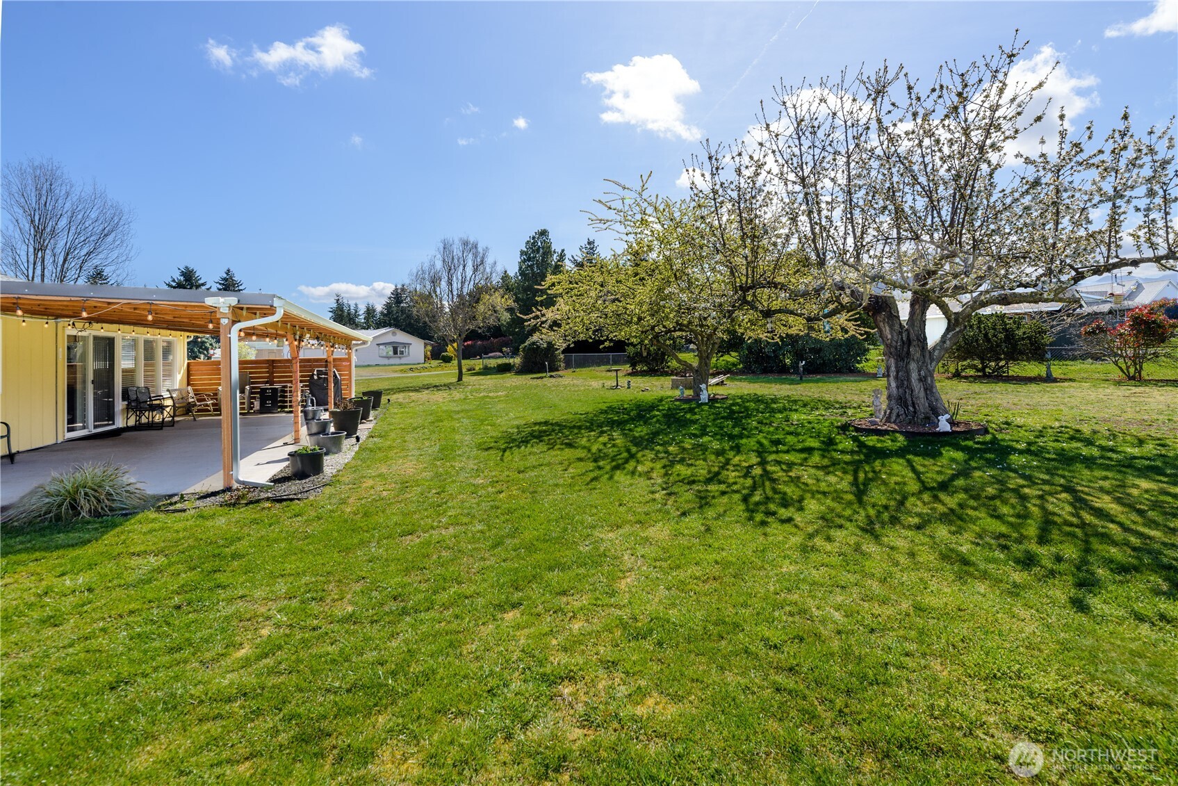 1111 West Alder Court Sequim, WA 98382 - Photo 32 of 37 a view of a house with a big yard