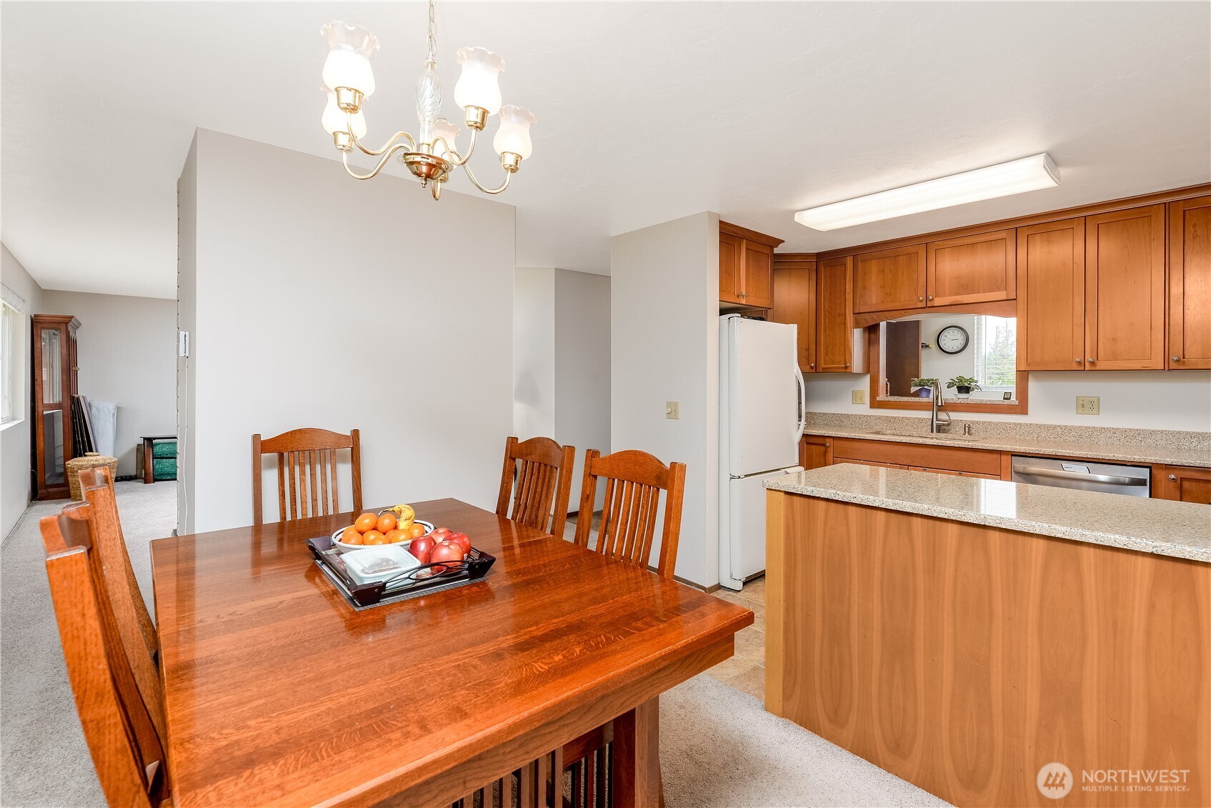 1111 West Alder Court Sequim, WA 98382 - Photo 10 of 37 a view of a dining room with furniture and a chandelier