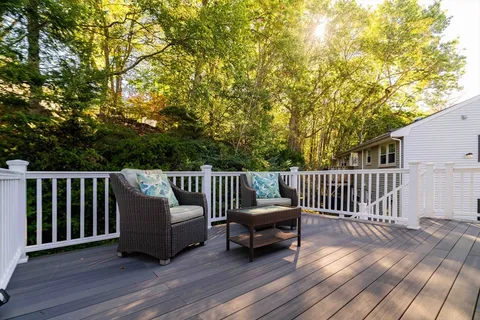 a view of a chair and wooden floor