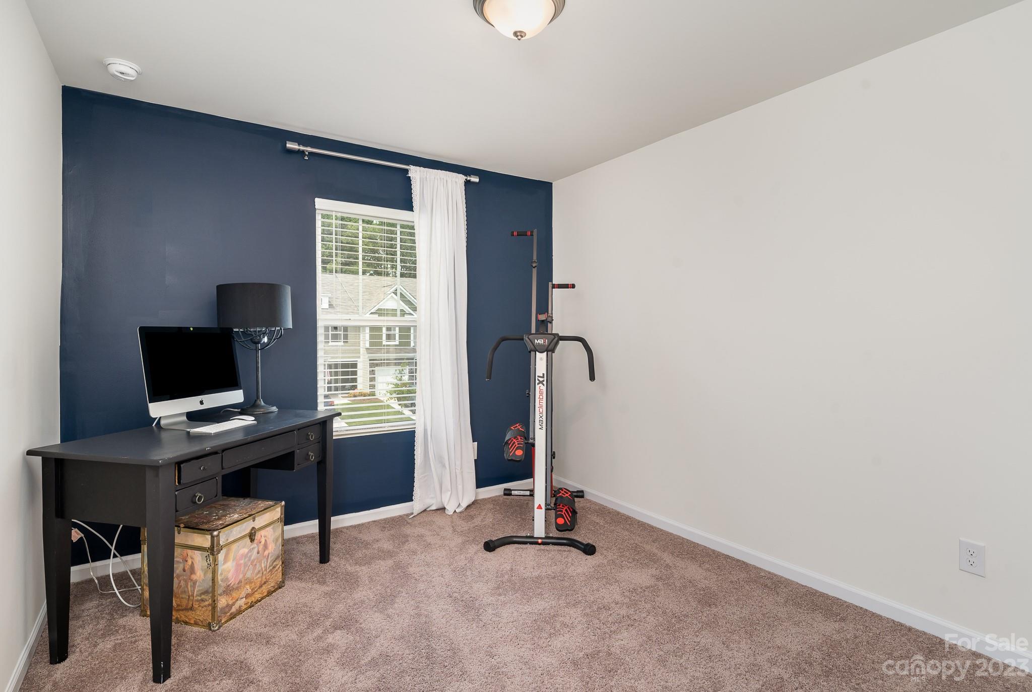 229 Quinn Road Matthews, NC 28104 - Photo 17 of 23 a view of a workspace with furniture and a window