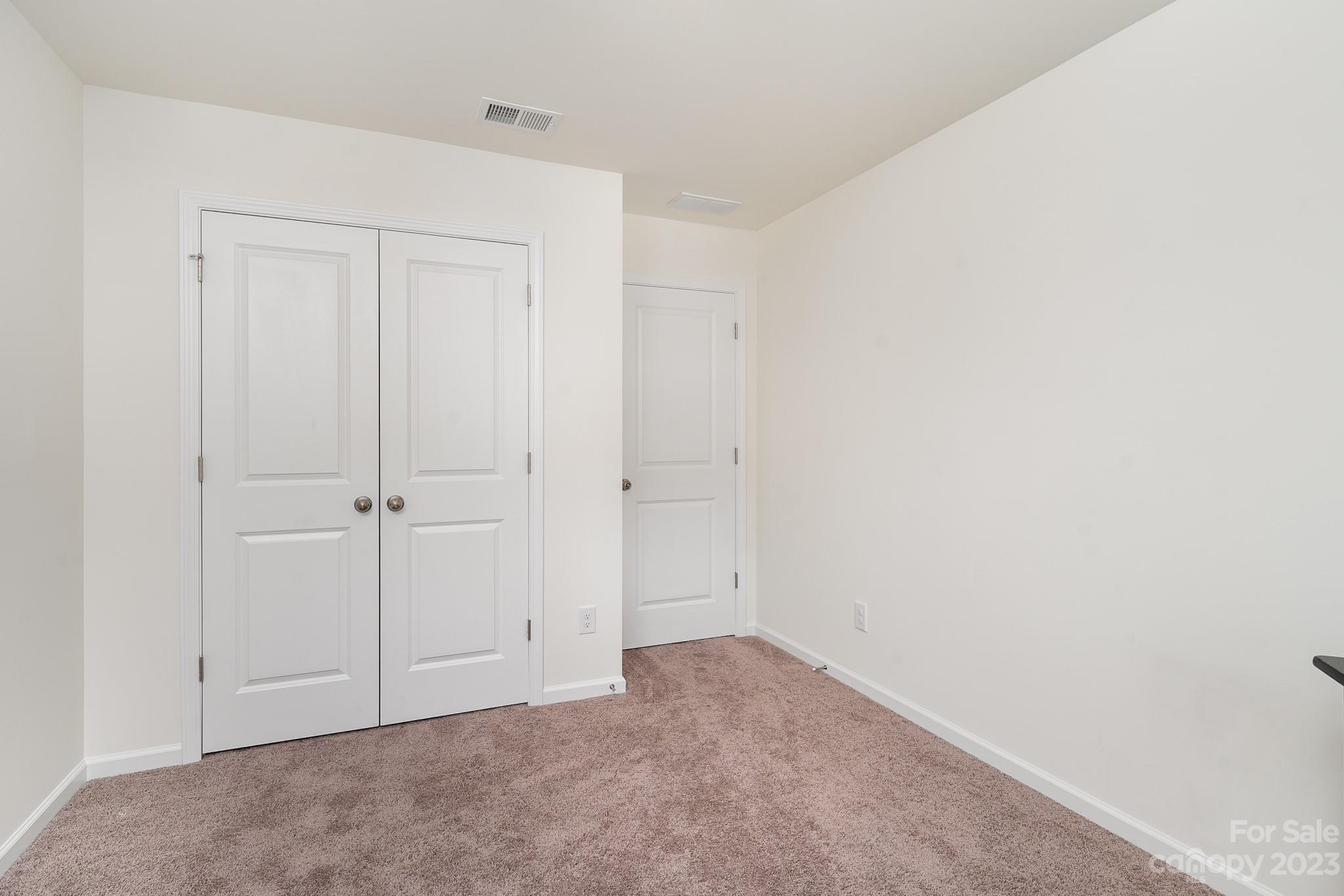 229 Quinn Road Matthews, NC 28104 - Photo 18 of 23 a view of an empty room