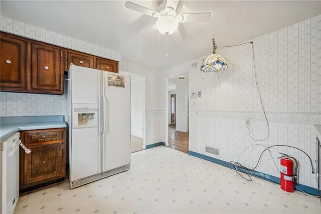 a bedroom with a bed and cabinets
