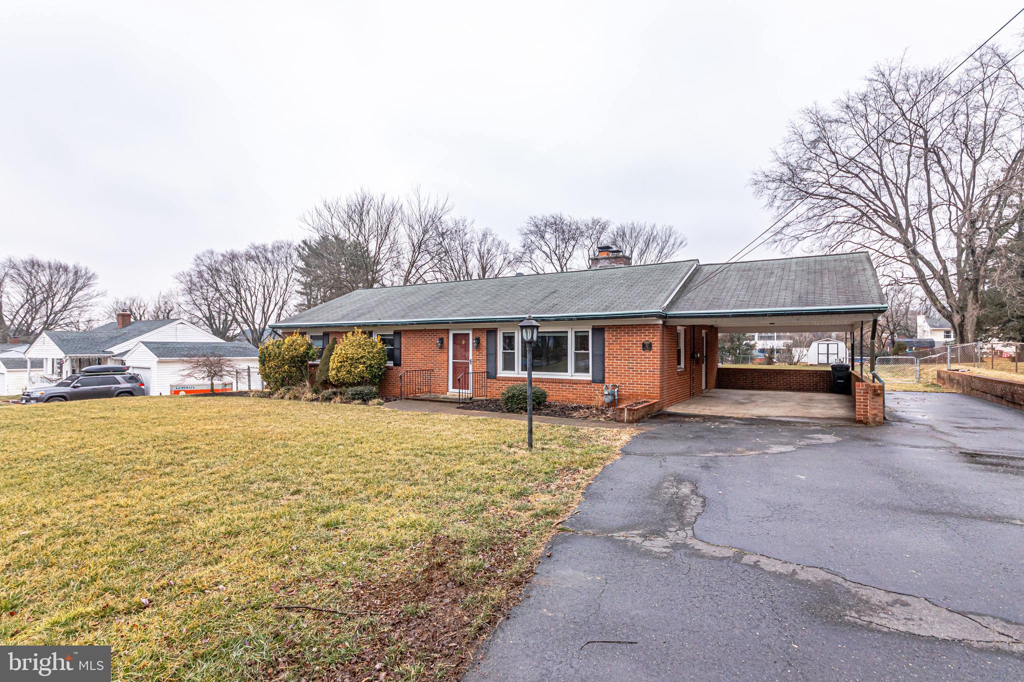 52 Blue Ridge Street Warrenton, VA 20186 - Photo 2 of 49 Huge driveway with covered carport