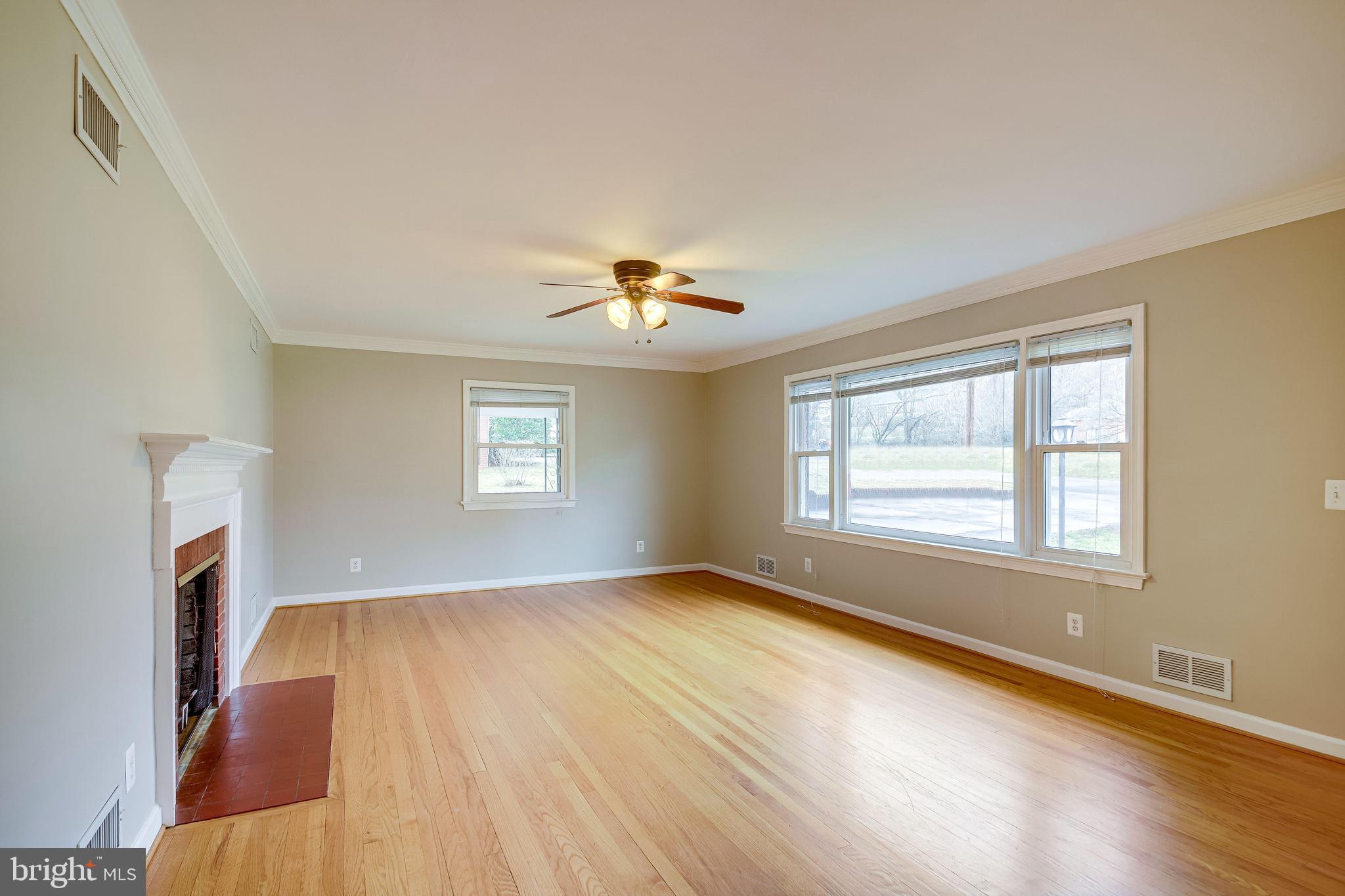 52 Blue Ridge Street Warrenton, VA 20186 - Photo 4 of 49 Living room with wood burning fireplace