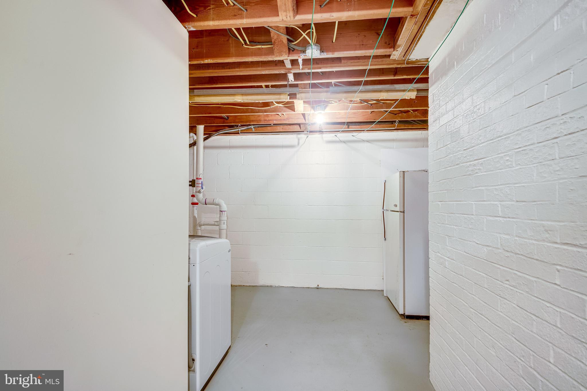 52 Blue Ridge Street Warrenton, VA 20186 - Photo 38 of 49 Laundry room in basement with newer washer/dryer