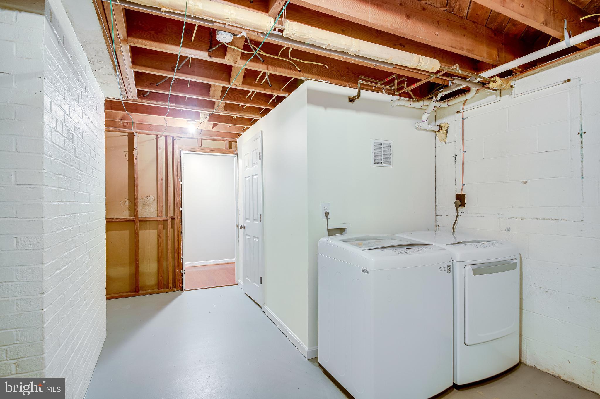 52 Blue Ridge Street Warrenton, VA 20186 - Photo 39 of 49 Laundry room in basement with newer washer/dryer