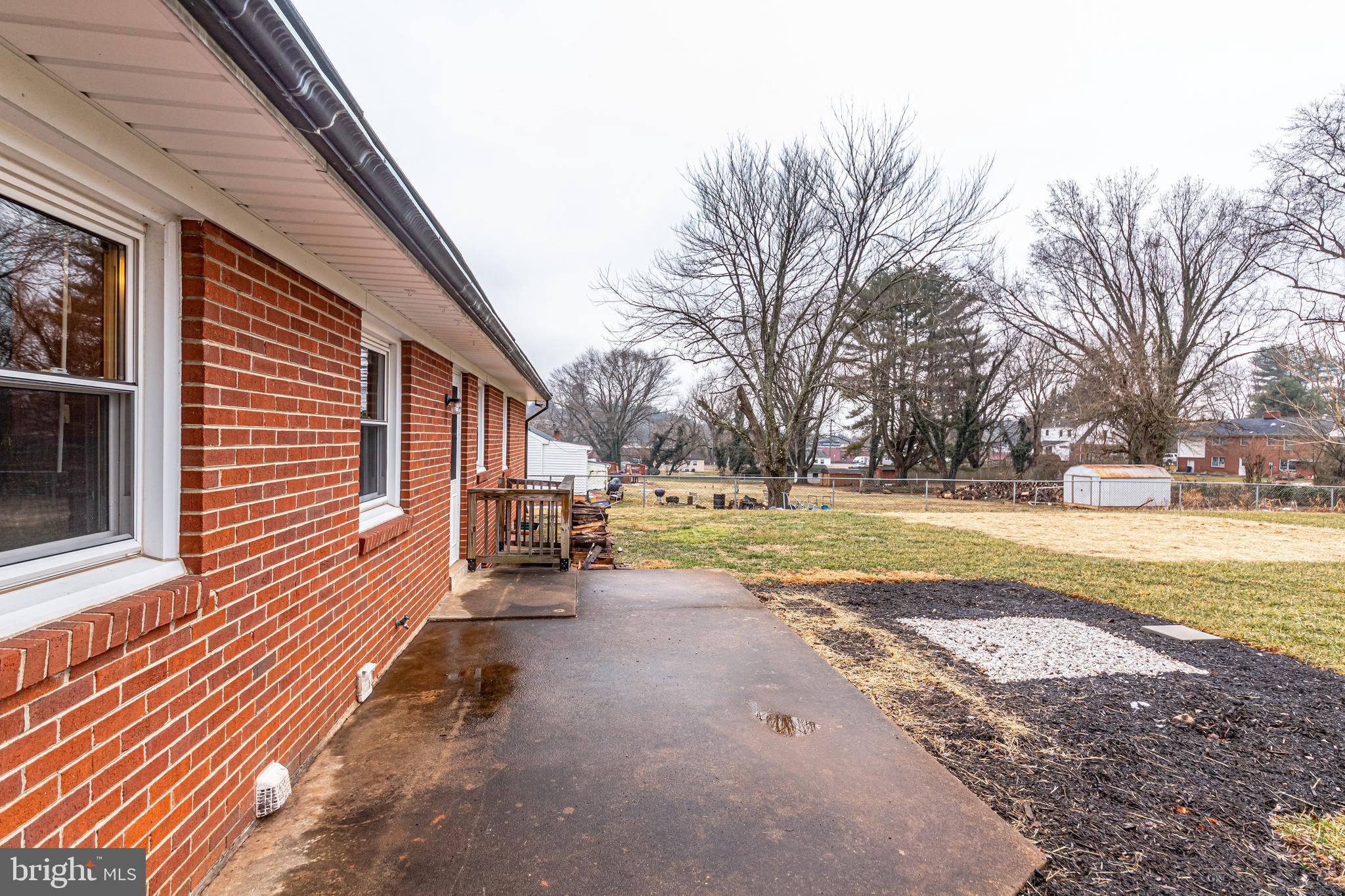 52 Blue Ridge Street Warrenton, VA 20186 - Photo 40 of 49 Patio space overlooking huge flat yard