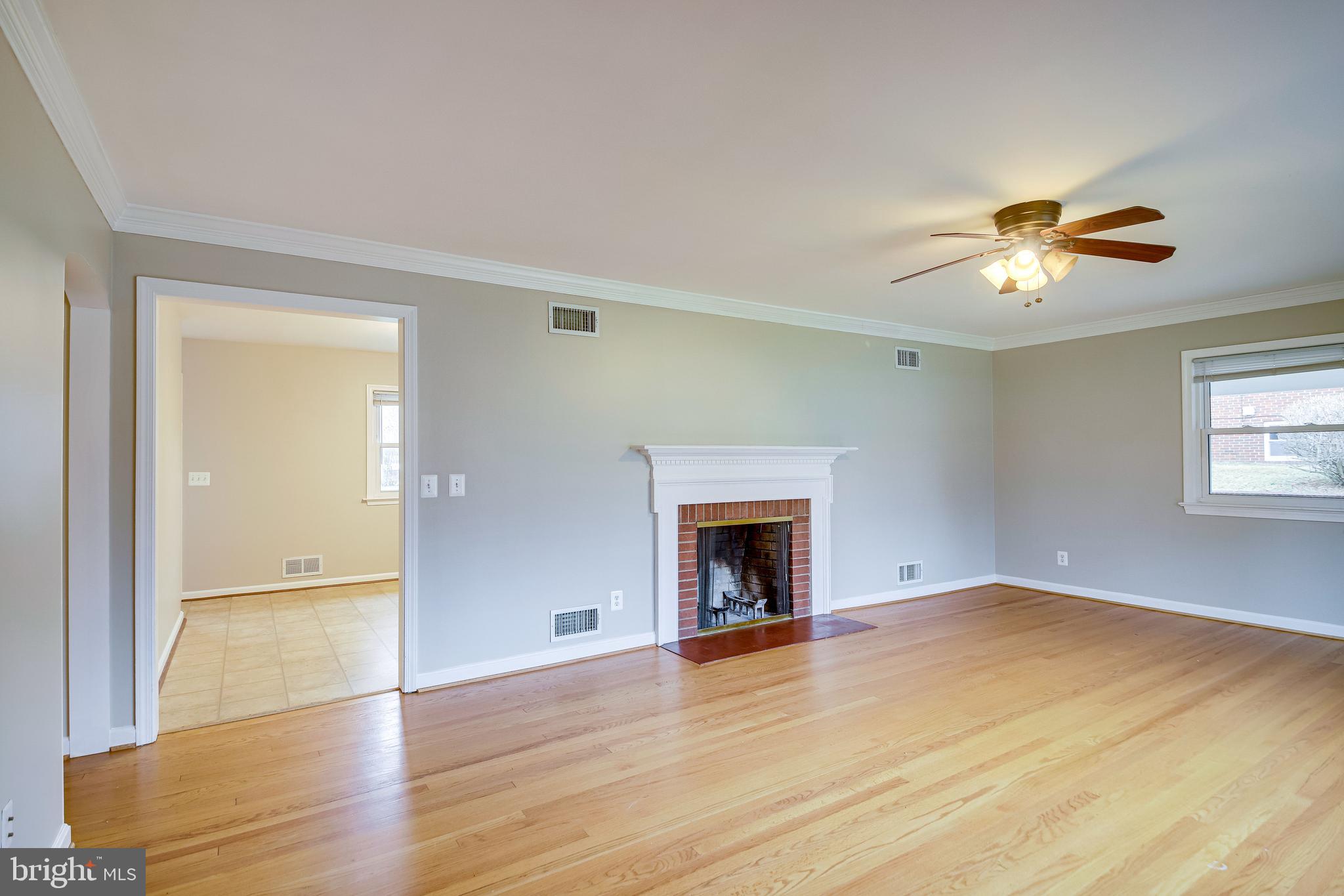 52 Blue Ridge Street Warrenton, VA 20186 - Photo 5 of 49 Living room with wood burning fireplace