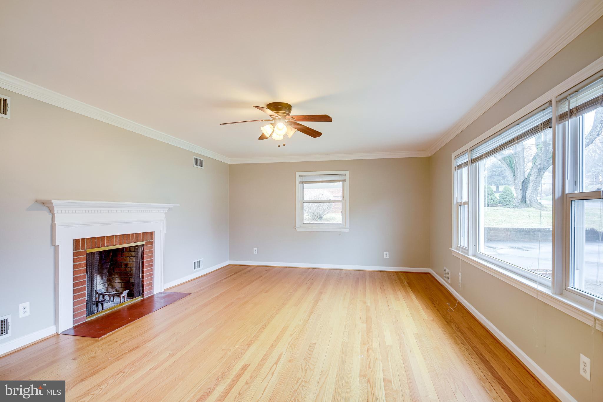 52 Blue Ridge Street Warrenton, VA 20186 - Photo 6 of 49 Living room with wood burning fireplace
