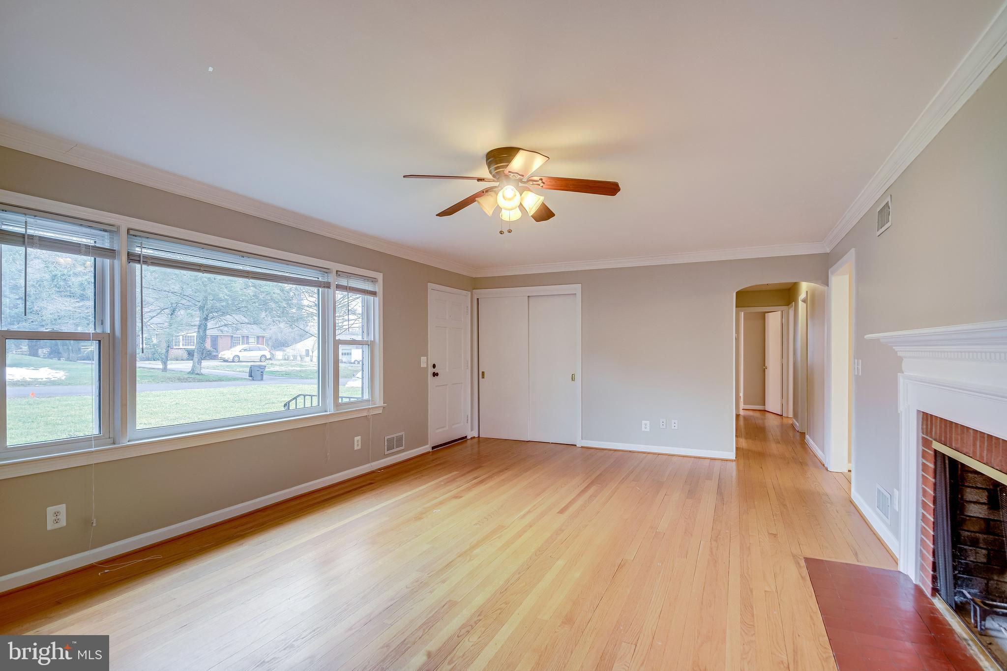 52 Blue Ridge Street Warrenton, VA 20186 - Photo 7 of 49 Living room with wood burning fireplace